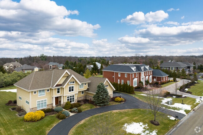 Large traditional-style homes in the Amberley neighborhood of Bond Hill, OH.