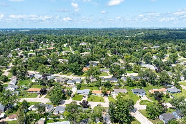 Aerial view of Vernon Heights: a grid of homes and green spaces creating a vibrant scene.