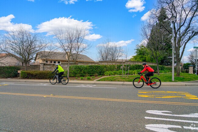 Buddies join each other for a lengthy bike ride through peaceful Whitney Oaks.