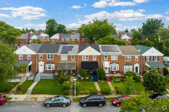 The quiet neighborhood of Ramblewood is comprised mostly of streets lined with rowhomes.