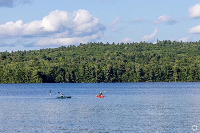 Kayakers enjoy Lake Sunapee at the Mount Sunapee State Park in Newbury, NH.