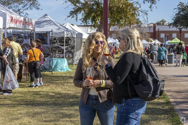 Sip wine while you shop in the beautiful weather at Phoenix Festival of the Arts.