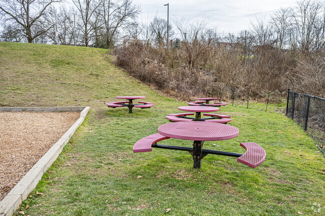 Small tables near the play yard give students a chance to relax at Baker Elementary School.