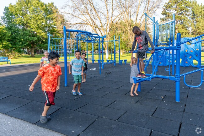 Kids from Cornhill enjoy the jungle gym at Watson Williams Park.