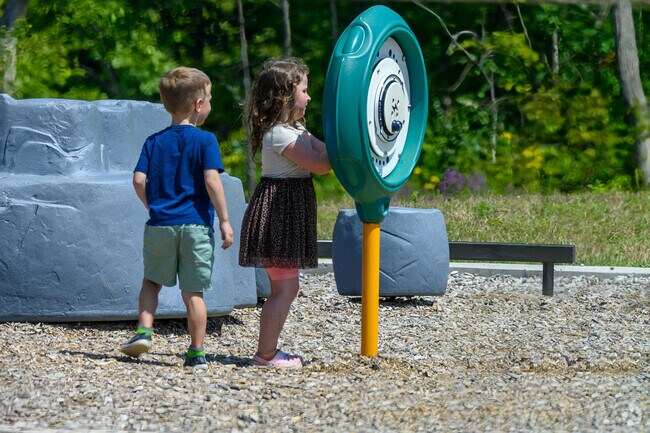 A couple of children enjoy one of four Milham Park playgrounds near South Westnege.