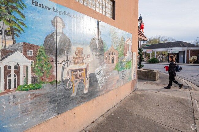 Small town murals painted by local artists are found all throughout Pleasant Lake.