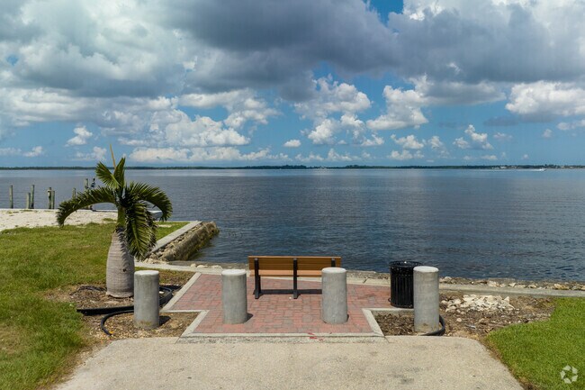 The Caloosahatchee River is just to the North of Palm Lee Park and has several  sitting areas where you can look at the water.