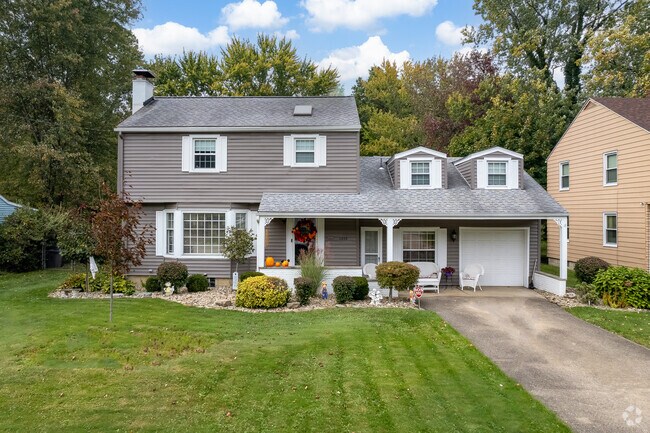 A two-story home in the Kirkmere neighborhood features a well-manicured front yard.