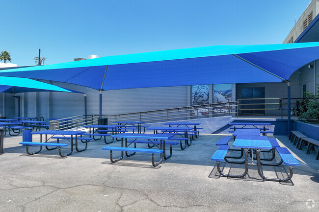 There is a large shaded outdoor seating area at Summit High School in central Phoenix.