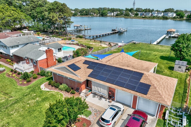 Spacious waterfront ranch homes define the laid-back charm of North Camellia Acres.