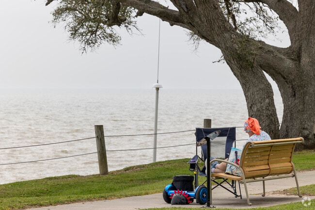 Unwinding with a book along the coastline at McCollum Park in Beach City brings tranquility.