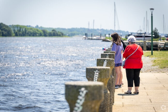 Enjoy serene fishing moments at Village Waterfront Park in Pottersville, cherished by locals.