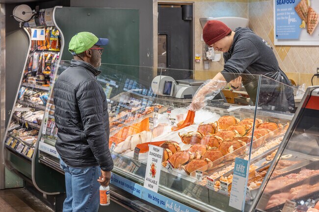The QFC near Manhattan is almost guaranteed to have some fresh groceries for you to shop for.