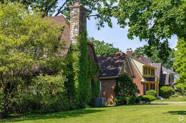 Some homes offer brick chimneys and vine covered exteriors in Near West Galena.