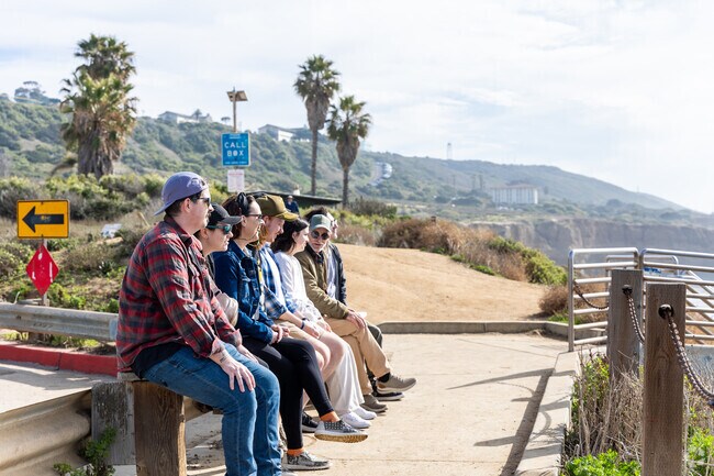 Visitors soak in the beauty Sunset Cliffs has to offer.