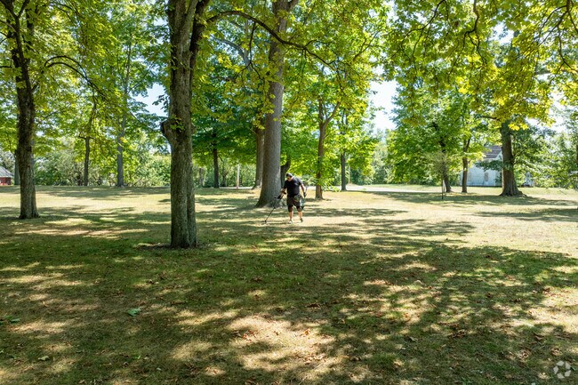 Nimissila Park's tree canopy provides comfortable shade on hot summer days in Ojays Parkway.