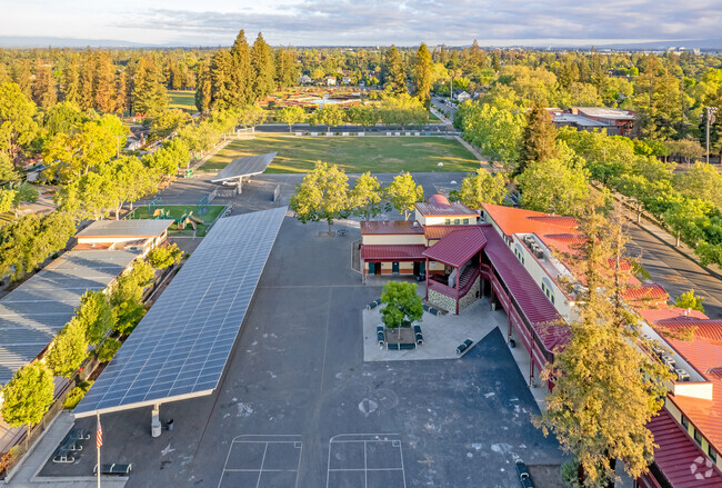 Overview of courtyards, recess area and sports fields of Merritt Trace Elementary.