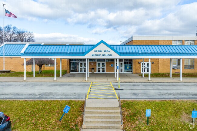 Derry Area Middle School welcomes students with a large shaded sidewalk.