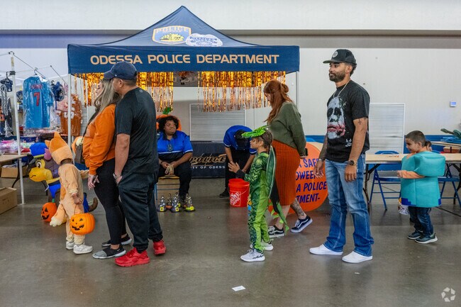 The Odessa Police Department engages with the Ranch Acres community during local family events.