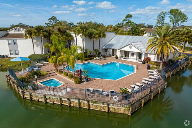 Many apartment buildings in Goldenrod offer luxury amenities like this clubhouse with a pool.