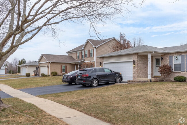 Homes in Hickory Oaks sit on quiet residential streets lined with trees and sidewalks.