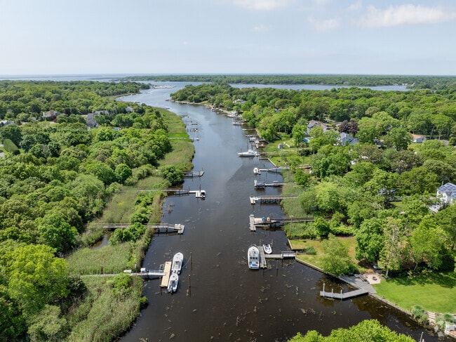 Moriches has the Forge River running through it leading to the bay.