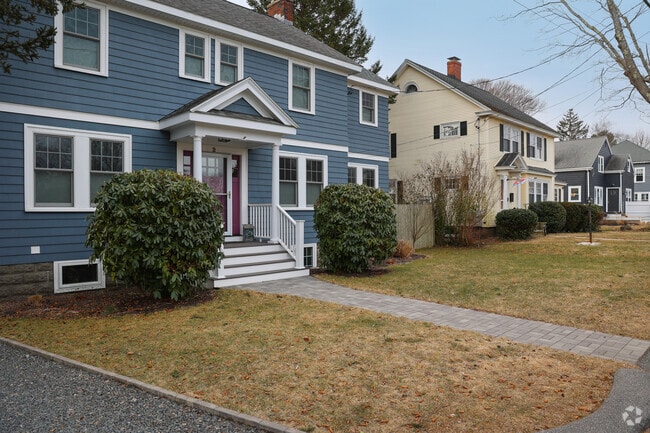 Rows of homes in Marblehead have large, lush front yards.