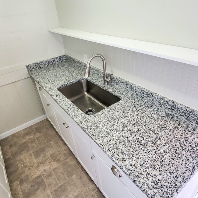 Luna Pearl granite. Large undermount sink