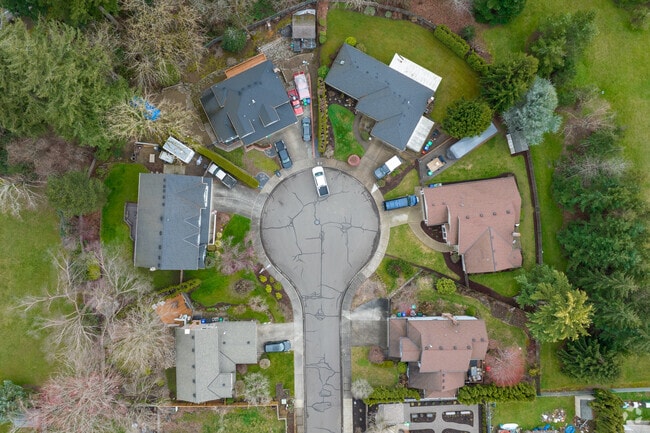 A quiet cul-de-sac in North Clackamas features well-kept homes and tree-lined streets.