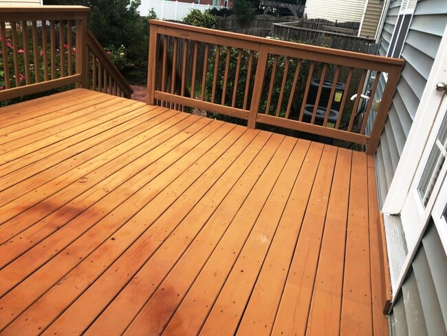 backyard deck with walkdown BBQ area