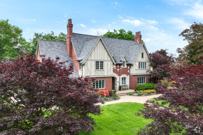 Larger Tudor style homes are scattered throughout the University South neighborhood.