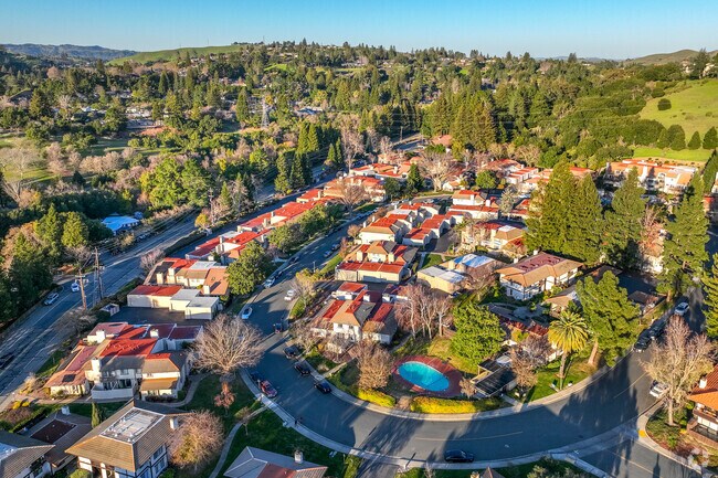 Clusters of homes on generous lots line the hilly roads of Moraga.
