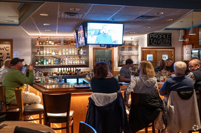 Pull up a stool to one of the many watering holes in Freetown.