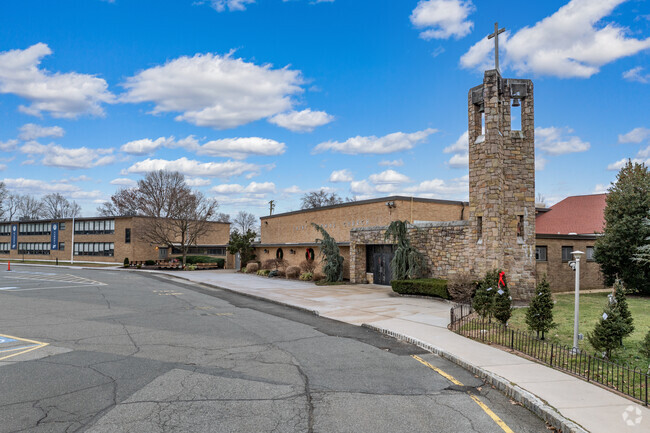 St. Thomas the Apostle School and the Roman Catholic Church.