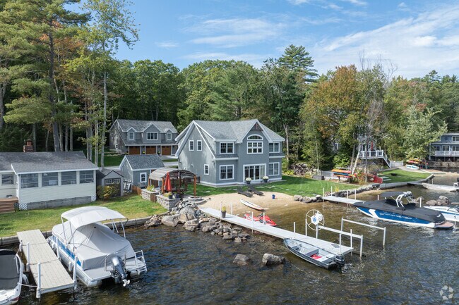 Just steps from the water's edge, this Strafford home captures the serene, timeless essence of lakeside living.