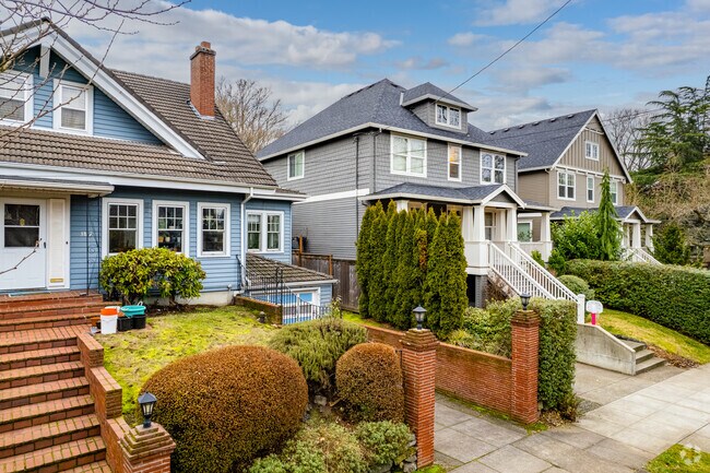 Recently built homes in Laurelhurst feature attractive stairwells leading to each entrance.