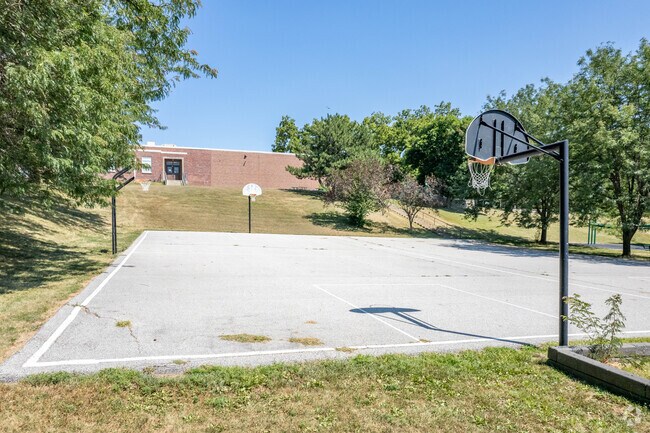 Young athletes enjoy the multiple basketball courts at Harrison Elementary School.