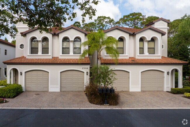The condos of the Serrano neighborhood feature built-in single car garages