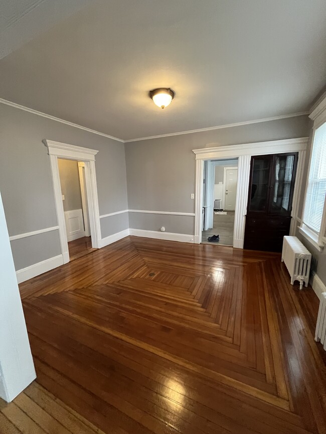 Formal Dining Room with built-in China cabinet. Beautiful HW floors.