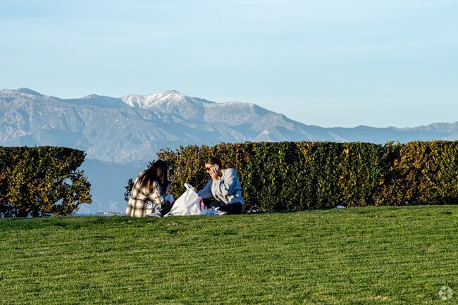 People enjoying a picnic and panoramic views from a park on Vantage Pointe in Rowland Heights.
