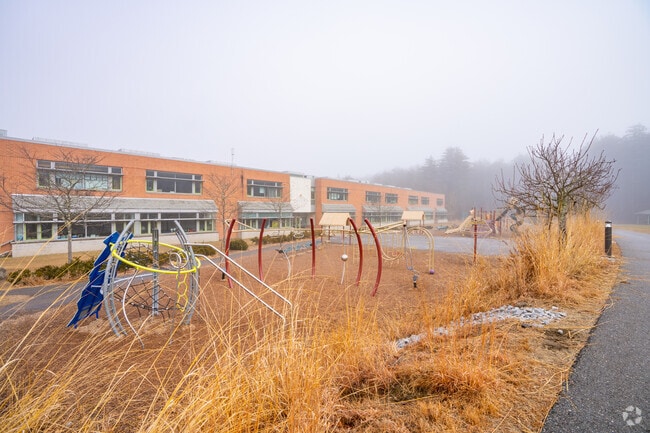 Students can enjoy a large play area behind the Willard School building in Concord.