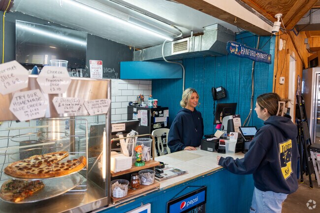 Enjoy pizzas, calzones, and chicken wings at Hanford Country Market.