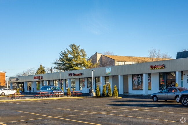The closest stores and restaurants near Camelot  are in the Moundford Plaza Shopping Center.