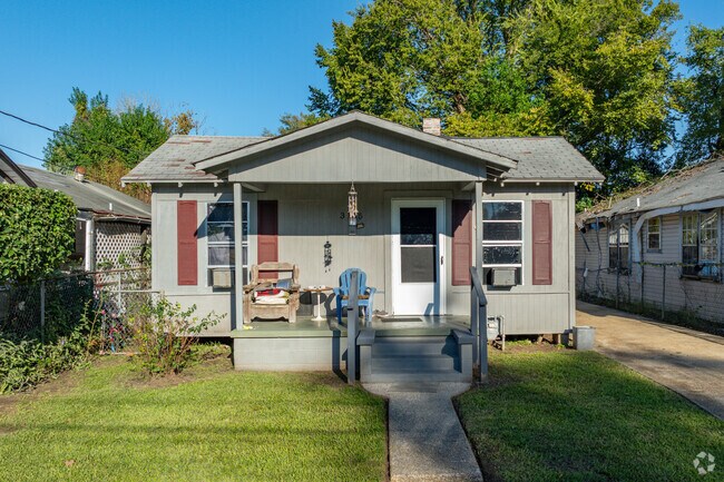 In the evenings residents of Sonia Quarters sit out on the porch and enjoy the cool air.