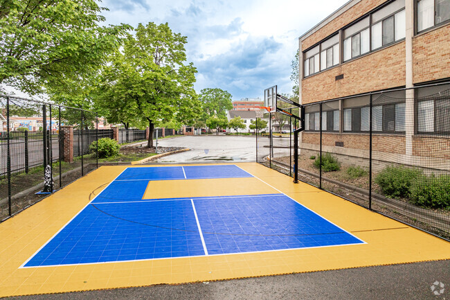 St. Stephen's Catholic School offers a small basketball court for recess play.