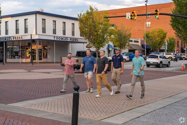 Find Cotswold residents rolling Toomers after a home football game.