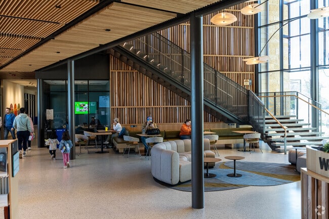 Locals enjoy the new Cedar Park Public Library, which offers free wi-fi.