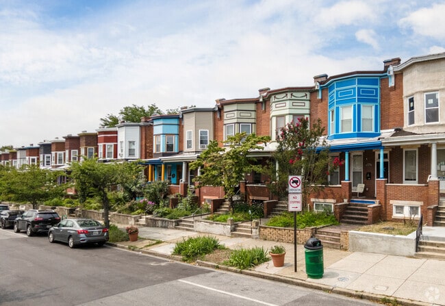 Painted rowhomes give Harwood a unique flair.