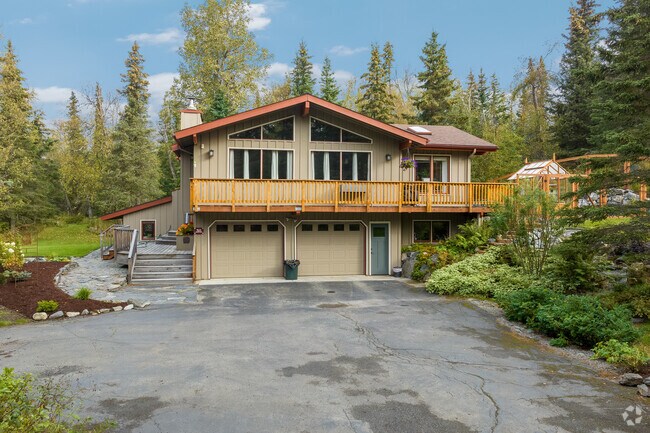 Large homes hidden among trees are typical of Basher.