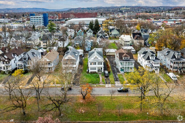 Three-story Victorian-inspired homes line Park Ave, and many have front patios on two levels.